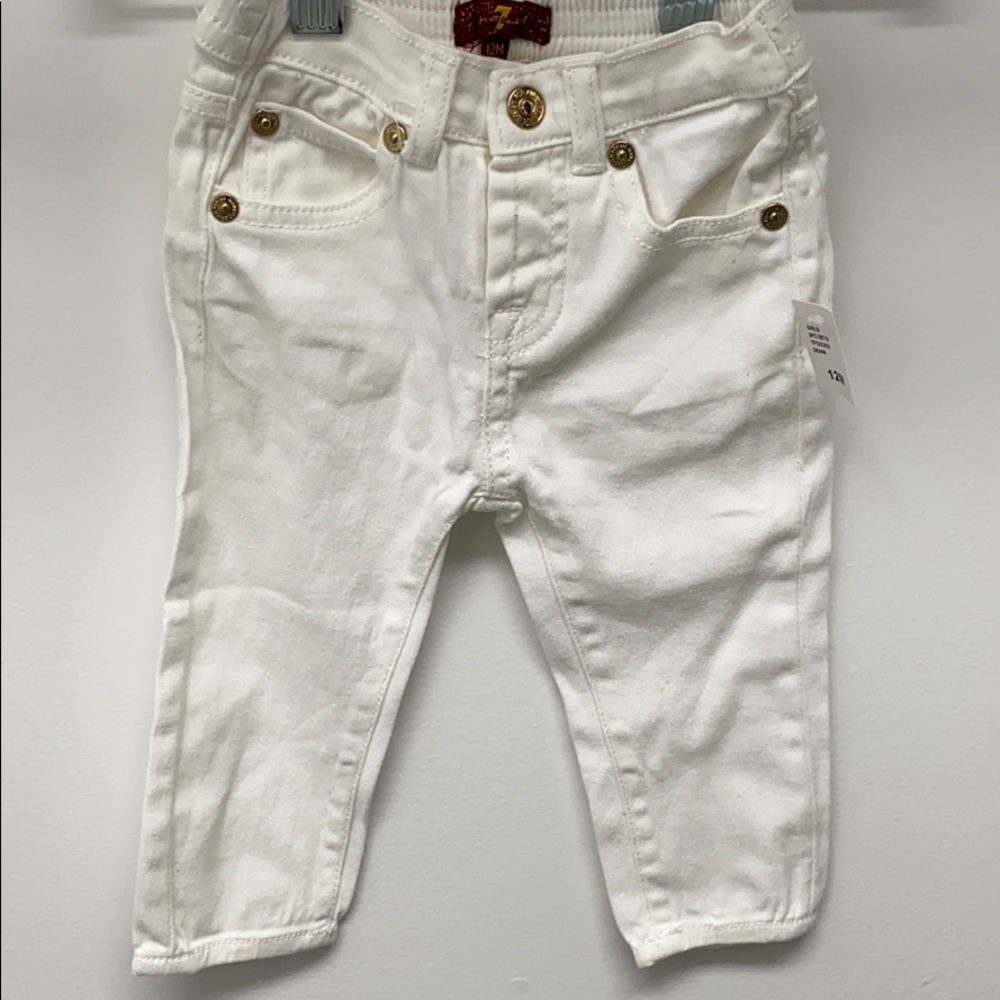 Baby girl’s white jeans. Never worn